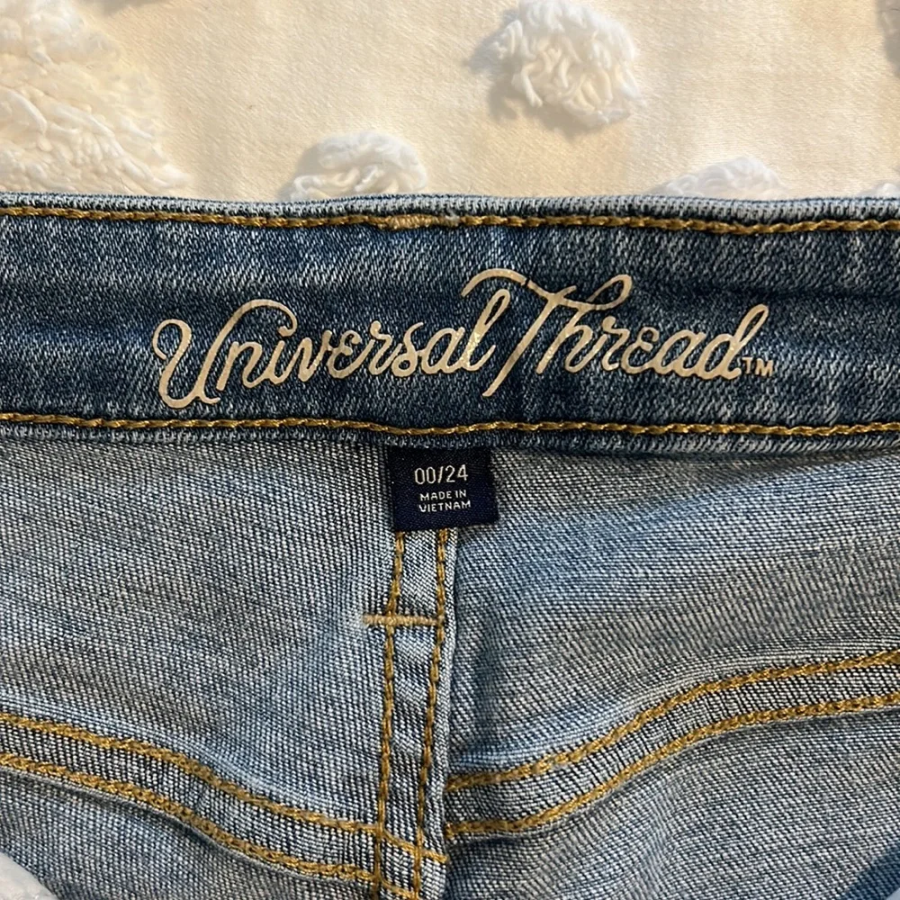 High-Rise Straight Crop Distressed Jeans - Picture 7 of 9